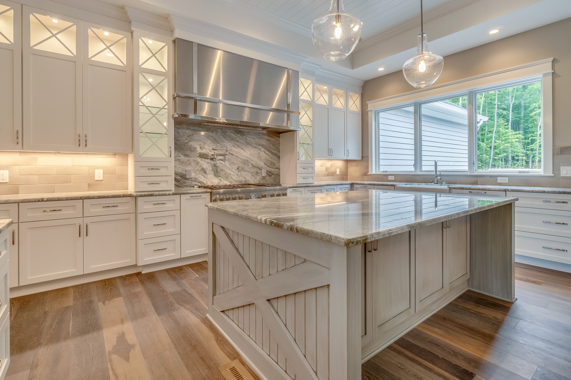 Beautiful kitchen with island and quartzite countertops